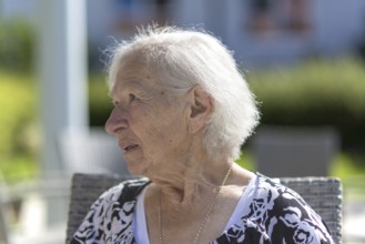 Thoughtful 86-year-old woman, retirement home, Jettingen, Baden-WÃ¼rttemberg, Germany