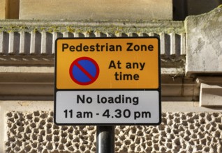 Pedestrian Zone access and loading restrictions sign in town centre of Ipswich, Suffolk, England,