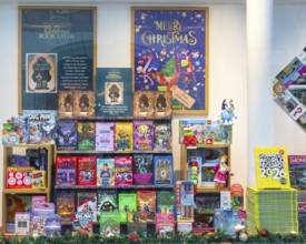 Children's books in window display of Waterstones bookshop, Ipswich, Suffolk, England, UK