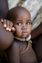 Portrait, baby, Himba children, traditional Himba village, Kaokoveld, Kunene, Namibia