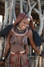 Young woman, Himba woman, traditional Himba village, Kaokoveld, Kunene, Namibia