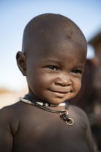 Himba Baby, traditional Himba village, Kaokoveld, Kunene, Namibia