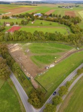 Landscape with fields, trees and a sports field photographed from a bird's eye view, PV