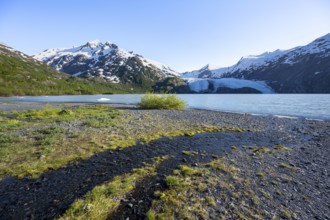 On the shores of Portage Lake, Snowy Mountains and Glaciers Portage Glacier, Chugach National