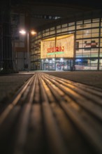 Entrance area of a Stern Center shopping center at night, festively illuminated, Sindelfingen,