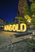 Glowing Nagold lettering and Christmas tree in the city center at night, Christmas market 2025,