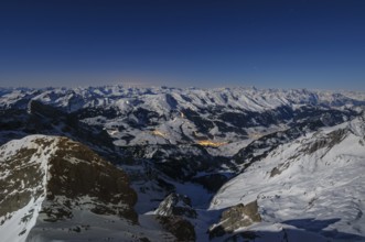 Night shot, long exposure from 2506 meter high SÃ¤ntis to the wintery, snow-covered Swiss Alps with