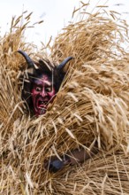 Buttnmandl with wooden mask, Berchtesgaden, Berchtesgadener Land, Upper Bavaria, Bavaria, Germany