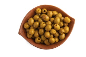 Fresh green olives in ceramic clay isolated on white background. Top view, flat lay, close up