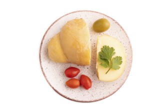 Smoked Mozzarella cheese, with tomatoes and olives isolated on white background, top view, flat