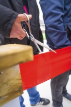 Opening scene with scissors cutting through a red ribbon, Sindelfingen, Böblingen district, Germany