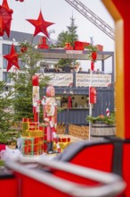 View of Christmas decoration with big red stars and gifts, Sindelfingen, Böblingen district,