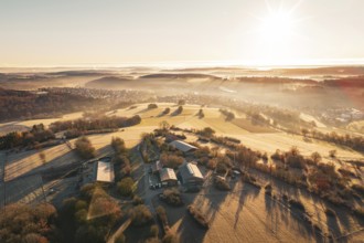 Aerial view of fields and hills at sunrise with light fog, Gechingen, Hecken and GÃ¤u region, Calw