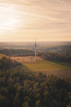 Radio mast overlooking a vast and quiet landscape, in soft evening light, Gechingen, Hecken and