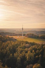 Bird's eye view of radio tower surrounded by thick forests at dusk, Gechingen, Hecken and GÃ¤u