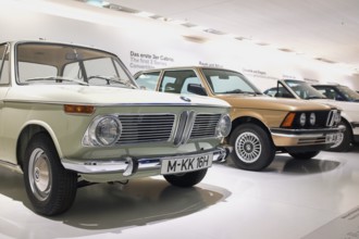 Classic BMW vehicles in the BMW Museum in Munich, In the foreground is a BMW 1600 built in 1966, it