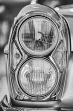 Detailed view, black and white photography, twin headlights for various classic Mercedes-Benz