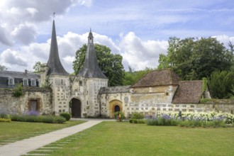 Double tower with entrance gate at the Abbey of, Le Bec-Hellouin, Eure, France