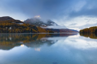 Clouds of fog over Lake Sils with Piz da la Margna in the background, Upper Engadin, Canton of
