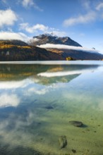 Clouds of fog over Lake Sils with Piz da la Margna in the background, Upper Engadin, Canton of