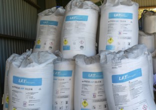MYPREMIAN ammonium nitrate LAR nitrogen fertiliser bags stored in farm barn, Suffolk, England, UK
