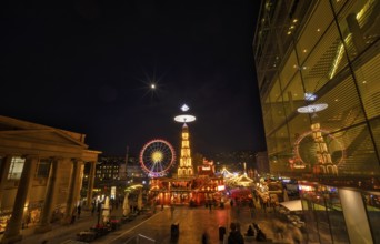 Night view, Christmas market with Christmas pyramid, reflection in the art museum, cube, Ferris