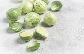 Fresh Brussels sprouts, raw, top view, on a gray table, no people