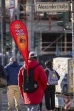 Ticket seller at AlexanderstraÃŸe, Alexanderplatz of the round bus hop on hop off, Berlin, Germany