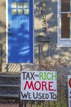 Washington, DC - Signs outside a home on Capitol Hill opposing Trump Administration policies