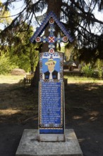 Wooden Grave cross from The Merry Cemetery of Sapanta in Maramures, Village Museum, Bucharest,