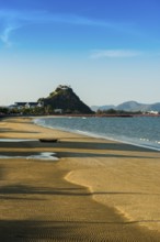 Lonely sandy beach and mountains, sunset, Prachuap Khiri Khan, Prachuap Khiri Khan Province,
