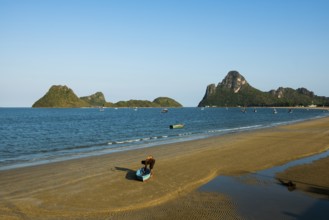 Lonely sandy beach and mountains, sunset, Prachuap Khiri Khan, Prachuap Khiri Khan Province,