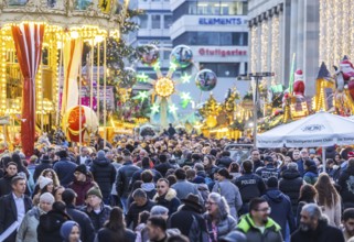 Busy shopping street in Stuttgart. Police patrol in the midst of the crowds. On the first weekend