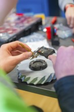 Caliper is used to measure a gear in a technical environment, Jugend Forschungszentrum Nagold,