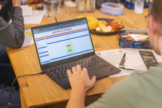 Exercises worked on laptop and writing materials at a table, Jugend Forschungszentrum Nagold, Calw