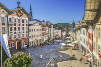 Historic market street with old town hall and typical gabled houses, Bad Tölz. Isartal, Upper