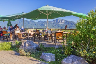 Restaurant terrace from Hofcafe zum Stern in the district of Zell, GroÃŸweil, Loisachtal, Das Blaue