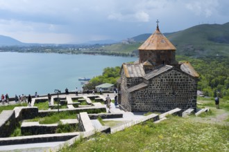 A monastery overlooking a lake surrounded by impressive scenery, Sevanavank Monastery, Sevan