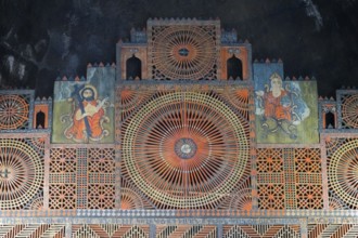 Ornamental altar decoration with complex geometric patterns and symbolic representations,