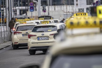 Taxis in front of the main train station in Berlin, waiting in line for passengers, Germany