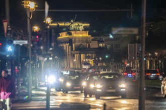 Evening traffic on EbertstraÃŸe, on 18th March Square, Brandenburg Gate, Berlin, Germany