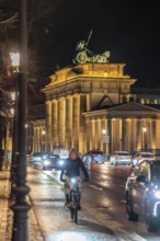Evening traffic on EbertstraÃŸe, on 18th March Square, Brandenburg Gate, Berlin, Germany