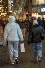 Passaten, shopping in the evening on TauentzienstraÃŸe in Berlin, Germany