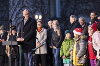 Friedrich Merz (CDU, Federal Chancellor of the Federal Republic of Germany) greets the Vocal Hero