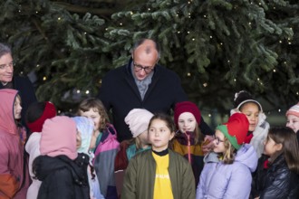 Friedrich Merz (CDU, Federal Chancellor of the Federal Republic of Germany) talks to children from