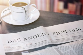 Close-up of a newspaper with the text THAT CHANGES 2026 (digitally edited)