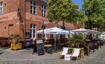 Catering, retail and typical, historic architecture in the Dutch Quarter in Potsdam, Brandenburg,