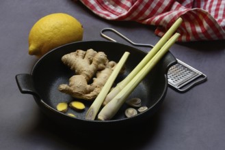 Ginger, ginger root and lemongrass in pot