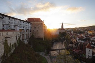 Spring morning sunrise with castle view over the rooftops of Krumlov in southern Bohemia, Czech