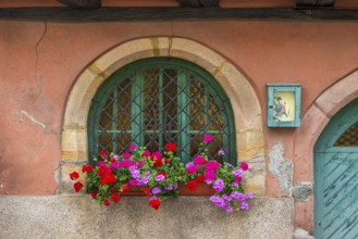 Window decorated with flowers in Ellsass, France